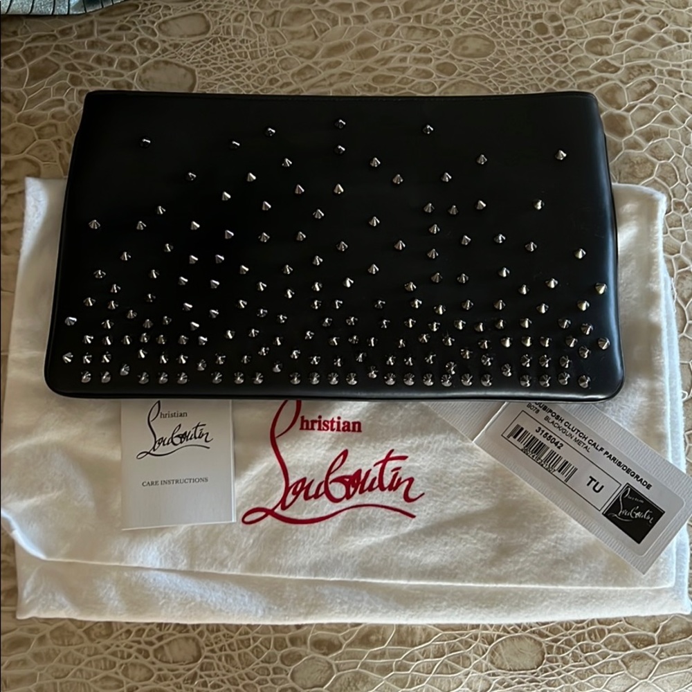 Leather spiked clutch